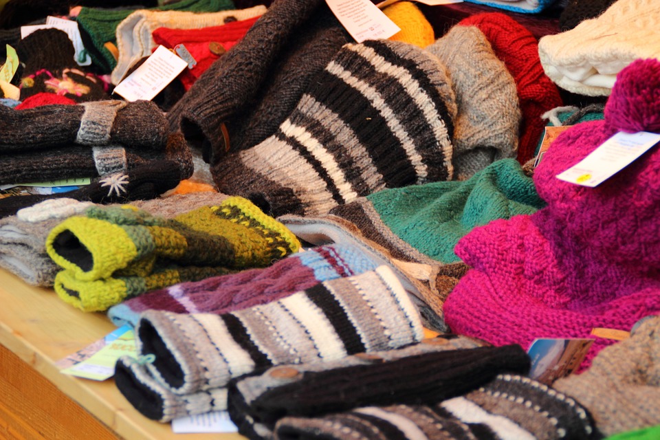 Various toques and mittens