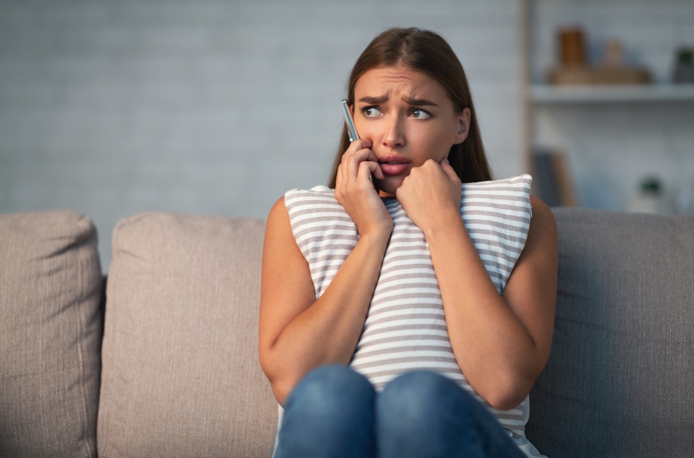 Woman Sitting On Sofa Scared Of What She Witnessed Calls Police